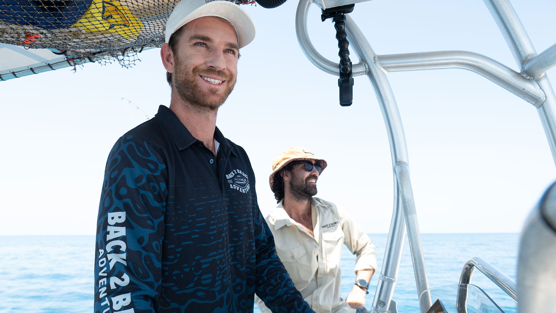 az and strick from back 2 basics adventures on a fishing boat wearing uv fishing jerseys
